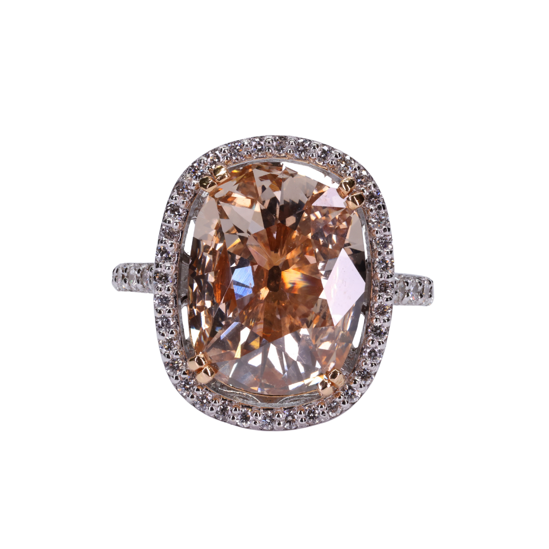 Old cut oval shaped orange brownish fancy intense diamond with Halo of Diamonds Ring