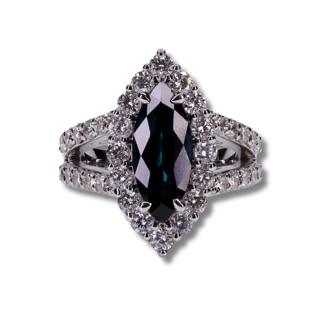 Imperial Marquise Sapphire Ring with a halo of Diamonds in 18K White Gold